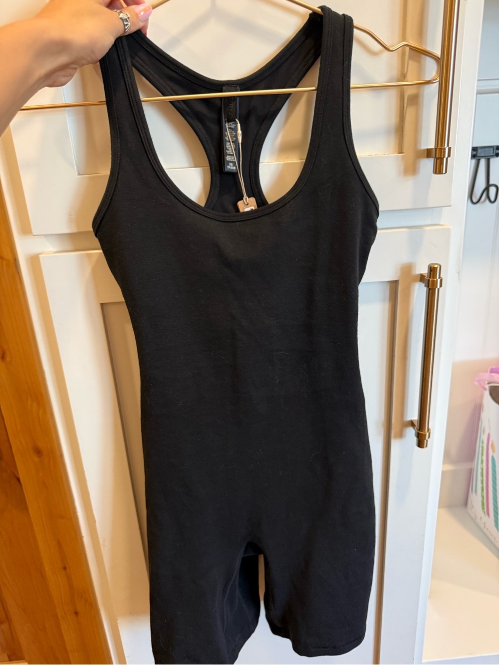 SKIMS Black Racerback One-Piece Bodysuit